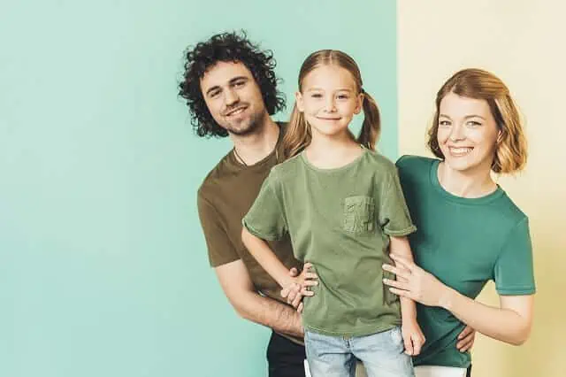 parents with daughter happy medium