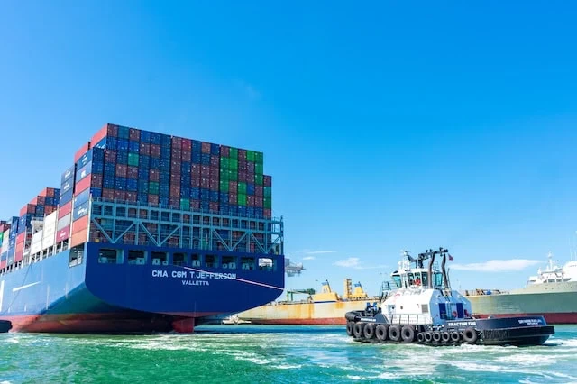 shipping containers tariffs tugboat