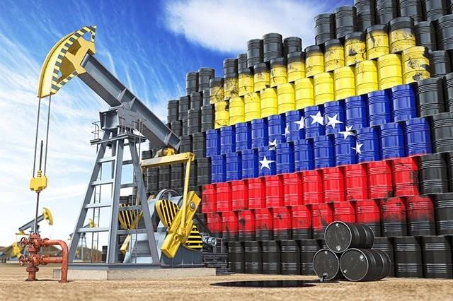 barrels of oil with the venezuelan flag on them.